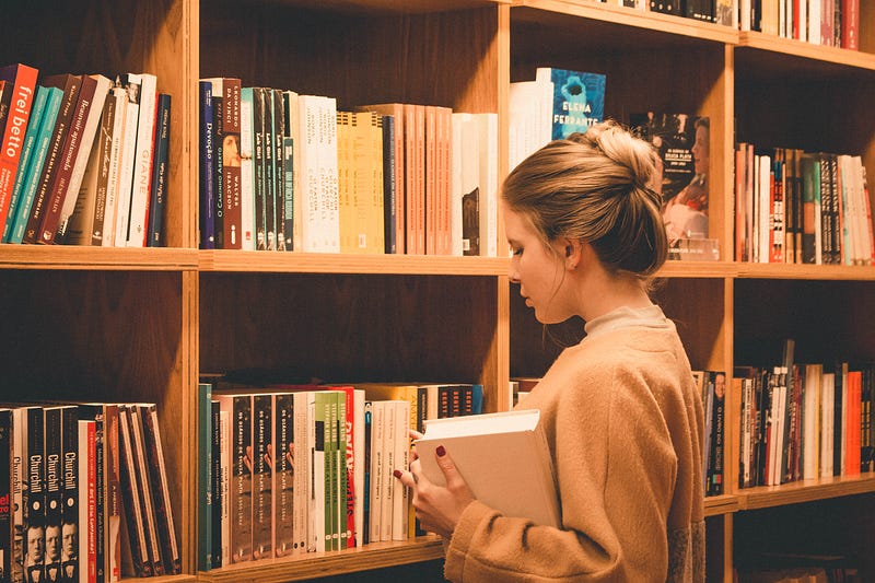 Friendly librarian deep in thought