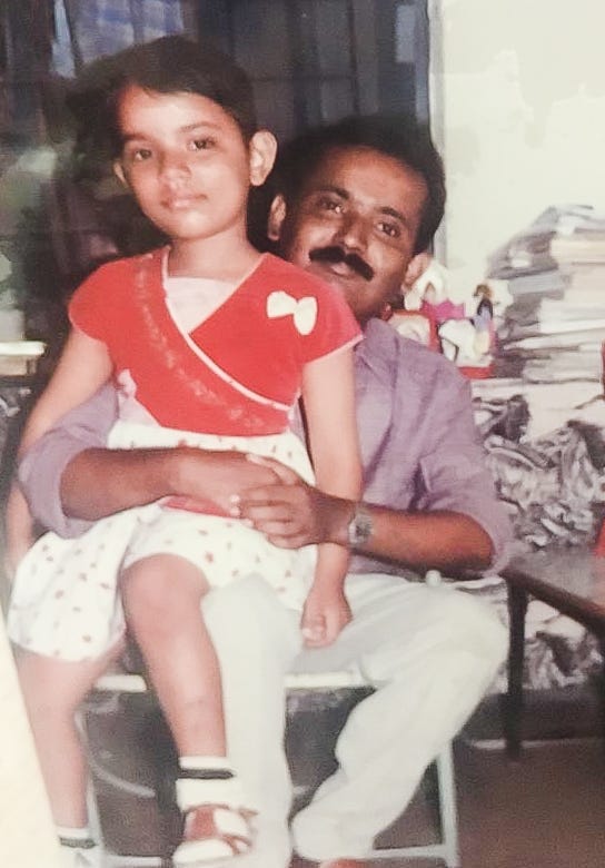 Priya with her father