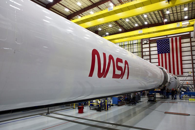 SpaceX Falcon 9 rocket launching Crew Dragon