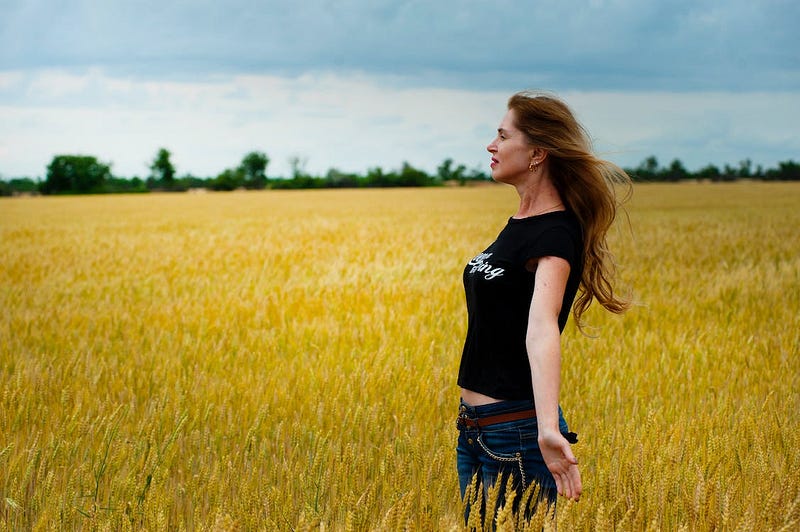 Person walking in nature, symbolizing personal growth