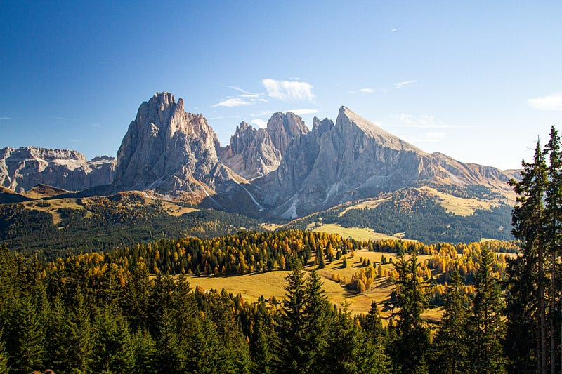 Grassy hills and mountains in Dolomites, Italy