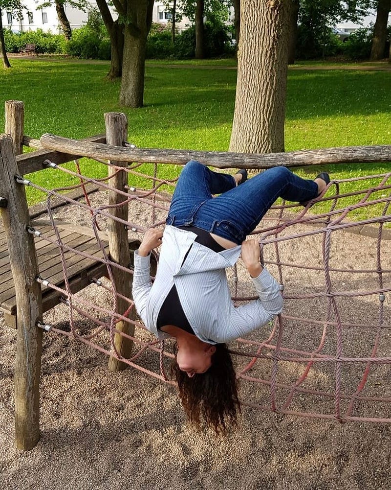 Practicing inversions at a playground